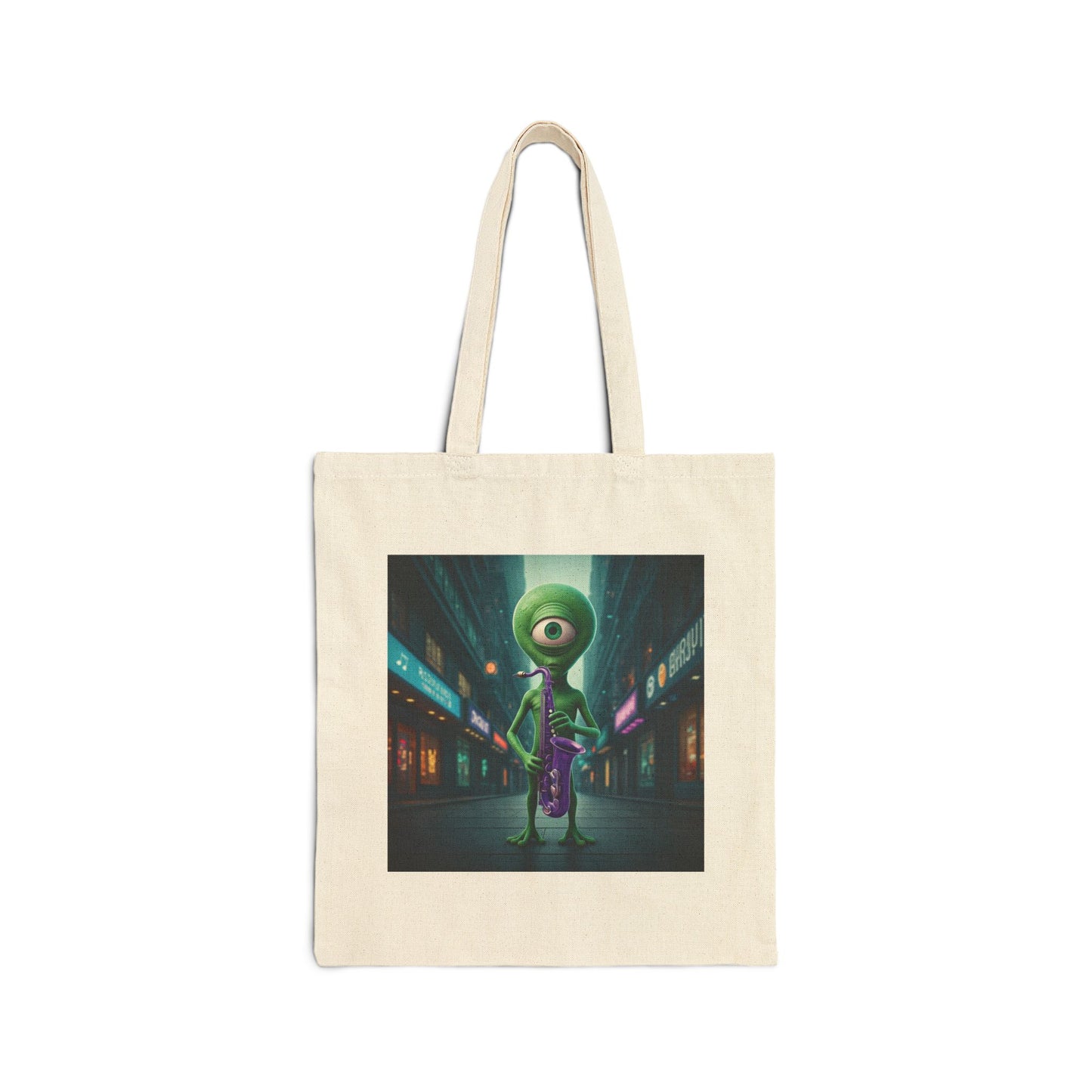 Alien playing sax in a empty city at Night. The alien Is featured on a Natural color Canvas tote bag.