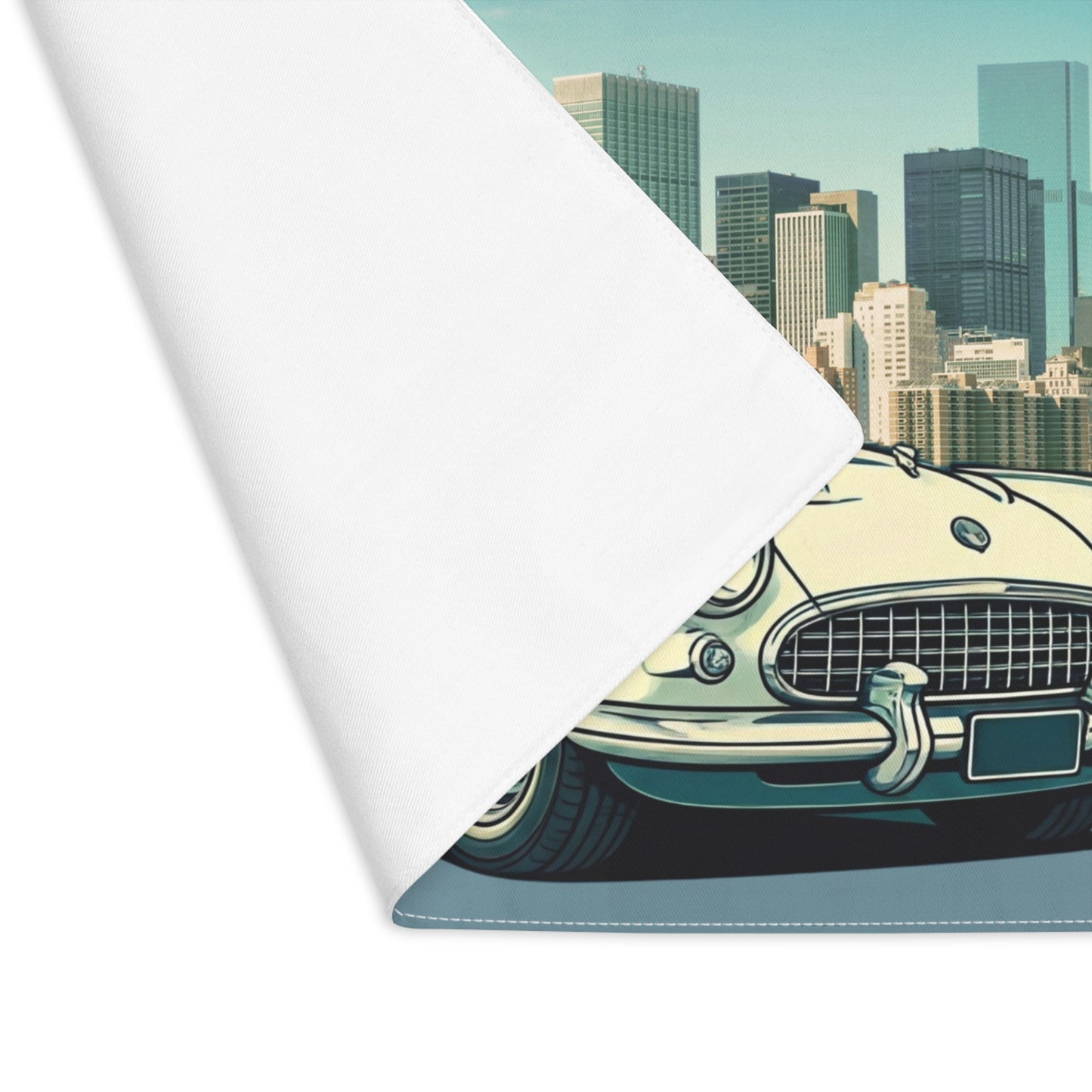 Roll of paper with a vintage car design Corvette on a cityscape background placemat