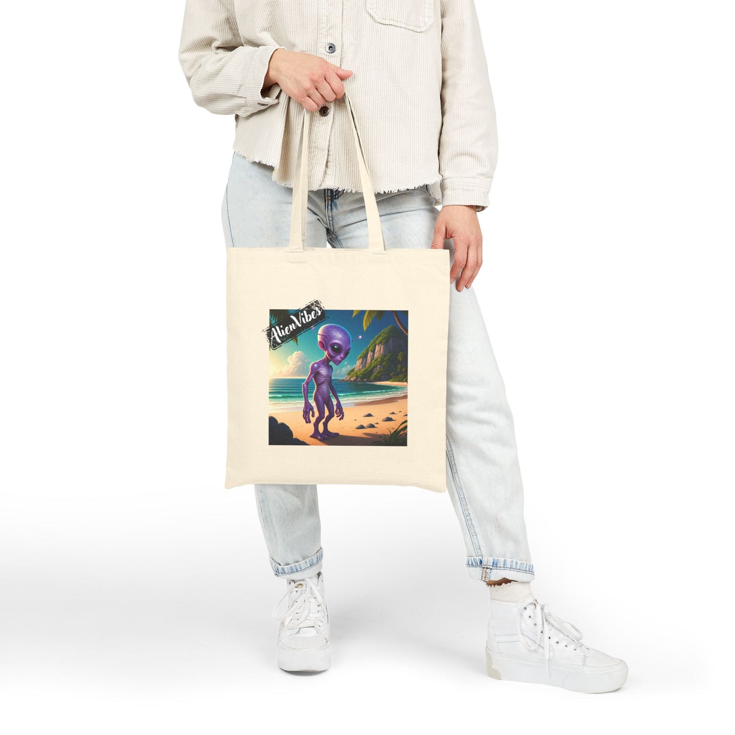Alien at Beach natural color tote bag: a funny alien walking on a sandy beach. Woman fashion.
