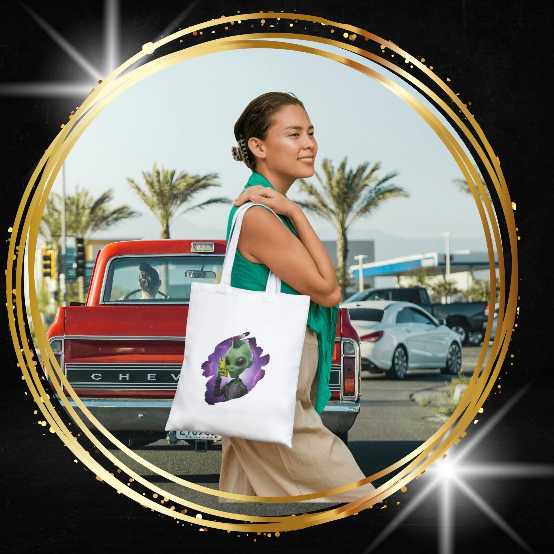 Woman holding a tote bag with a original design of a punk alien at mobile phone in New York city.