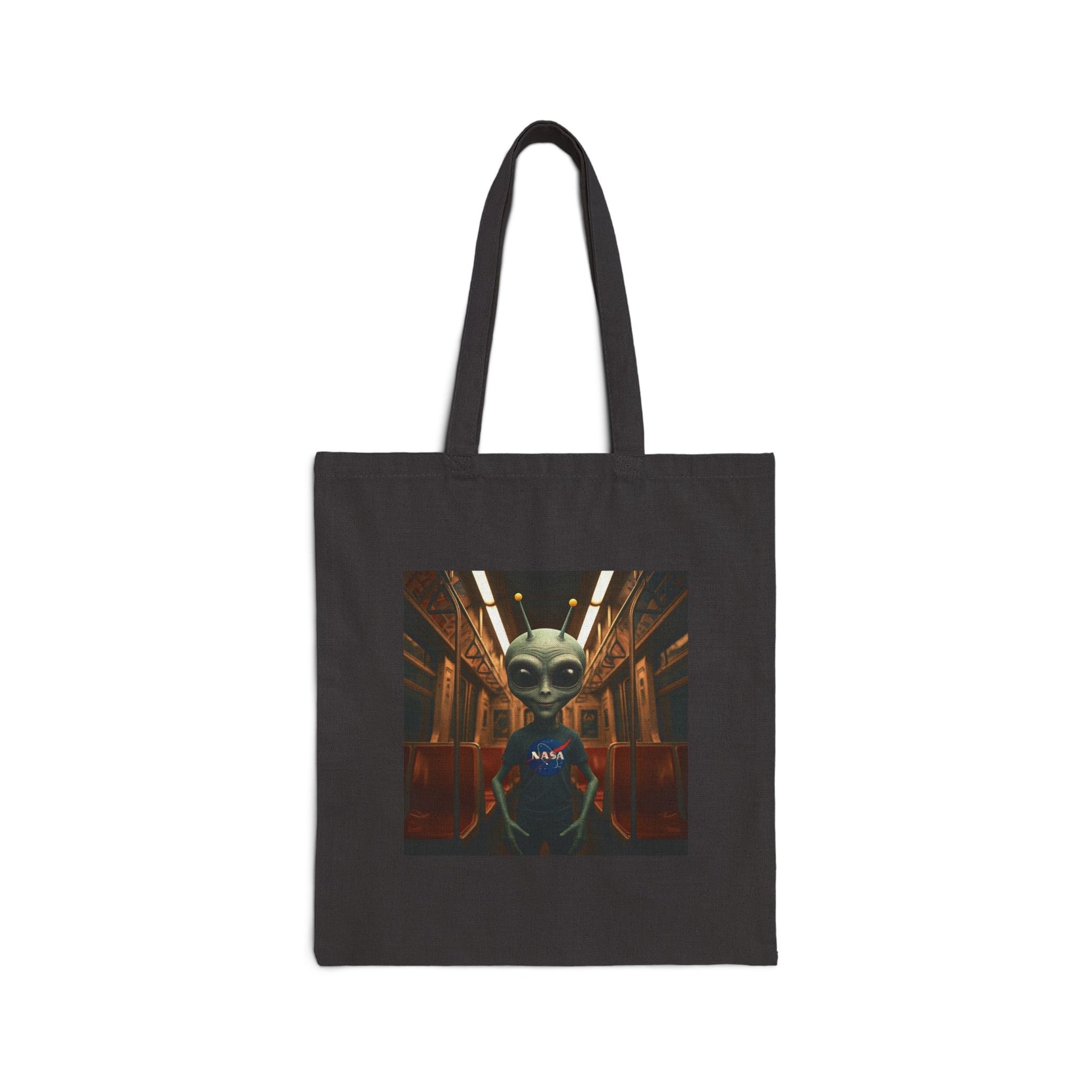 Quirky Alien in Subway on a black tote Bag highlighting a vibrant, multicolored design.