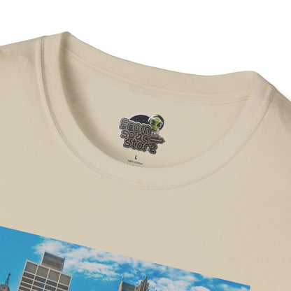 Beige t-shirt with a graphic design of a city skyline and a logo on the chest area.
