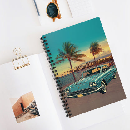 Notebook with a Cadillac Eldorado vintage car design on a white surface