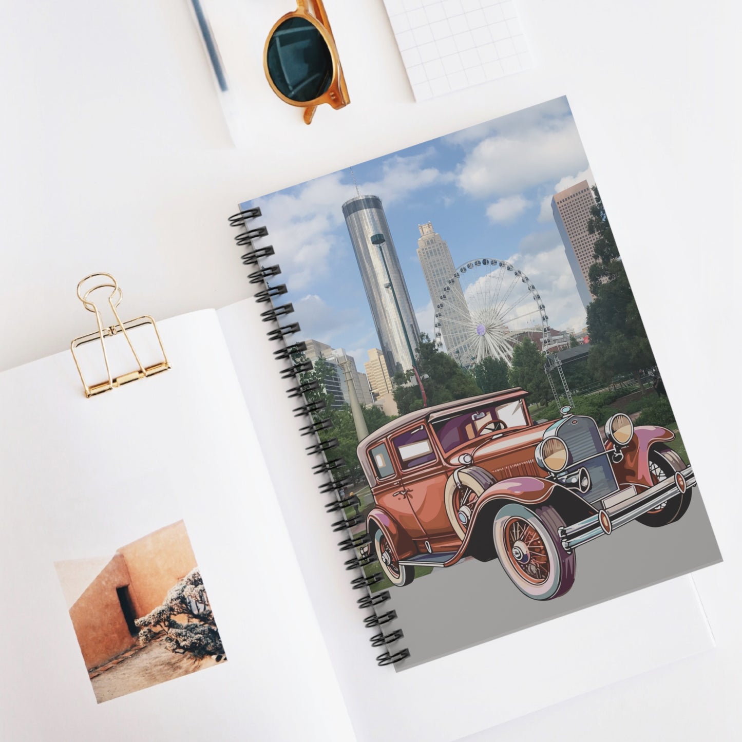 Notebook with a Ford T classic car design, skyliner background