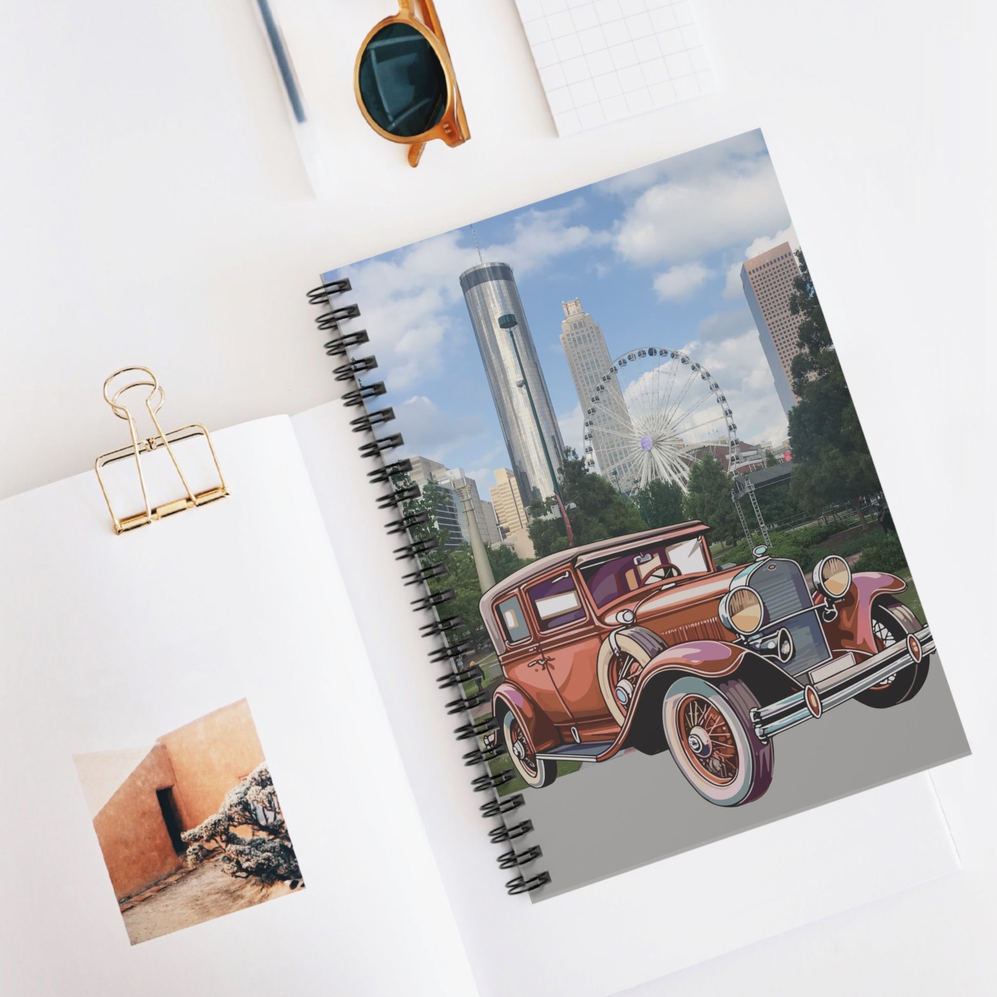 Notebook with a Ford T classic car design, skyliner background