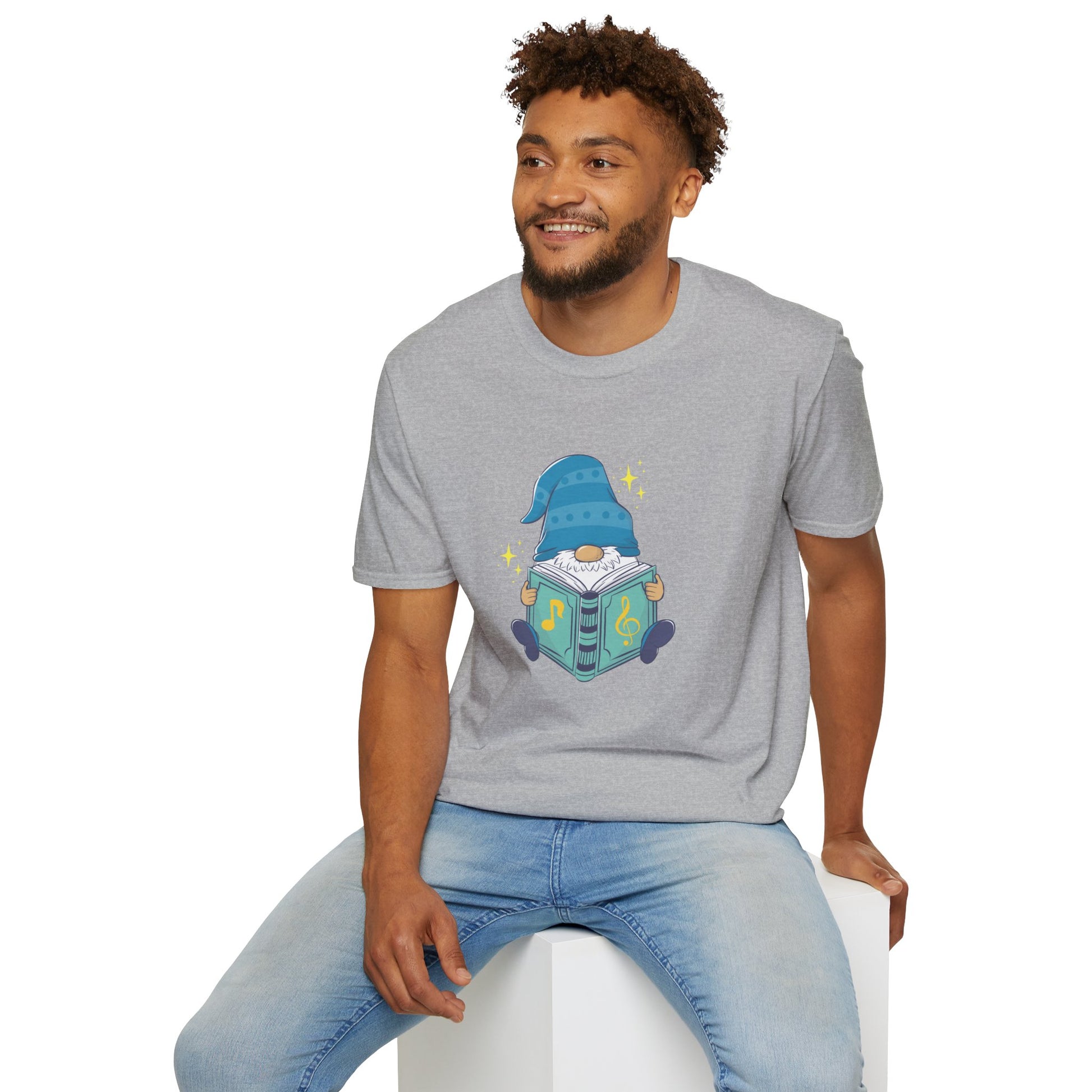 Man wearing a heather grey graphic t-shirt featuring a cute cartoon music gnome design from From Space Store