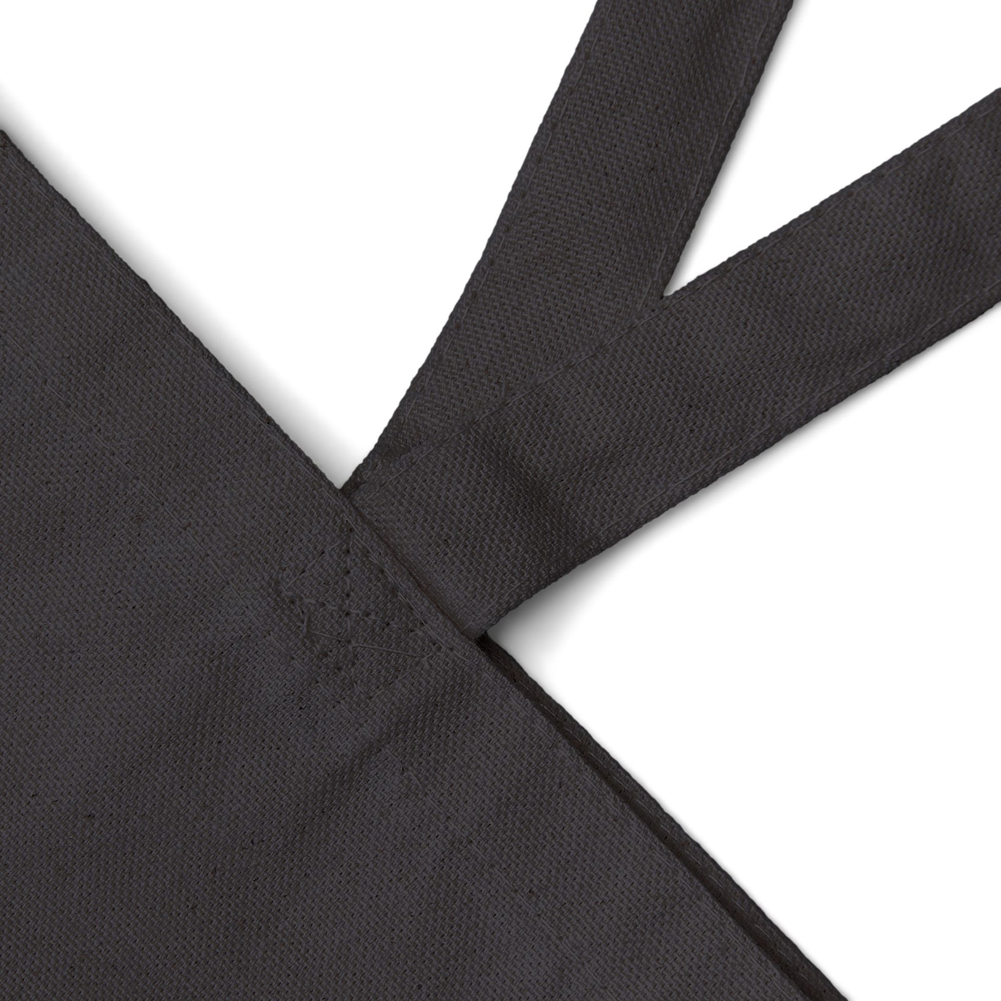 Black fabric with a subtle pattern on a white background