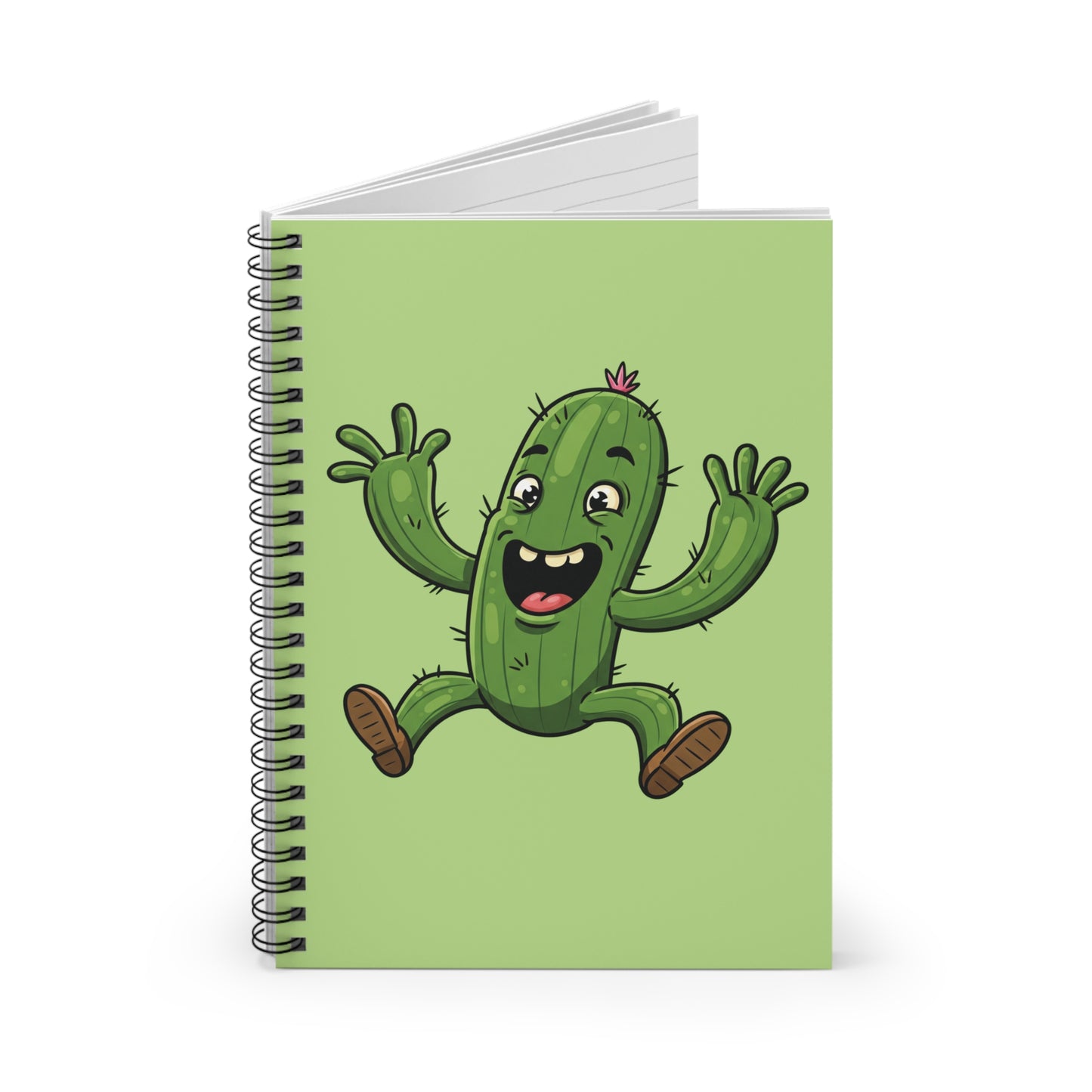 Close-up image of a spiral notebook with a funny cartoon jumping cactus graphic on the cover. Humorous stationery item for students and plant enthusiasts.
