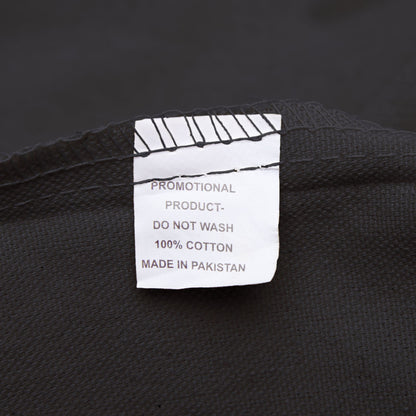 label detail of Quirky Alien in Subway black tote Bag
