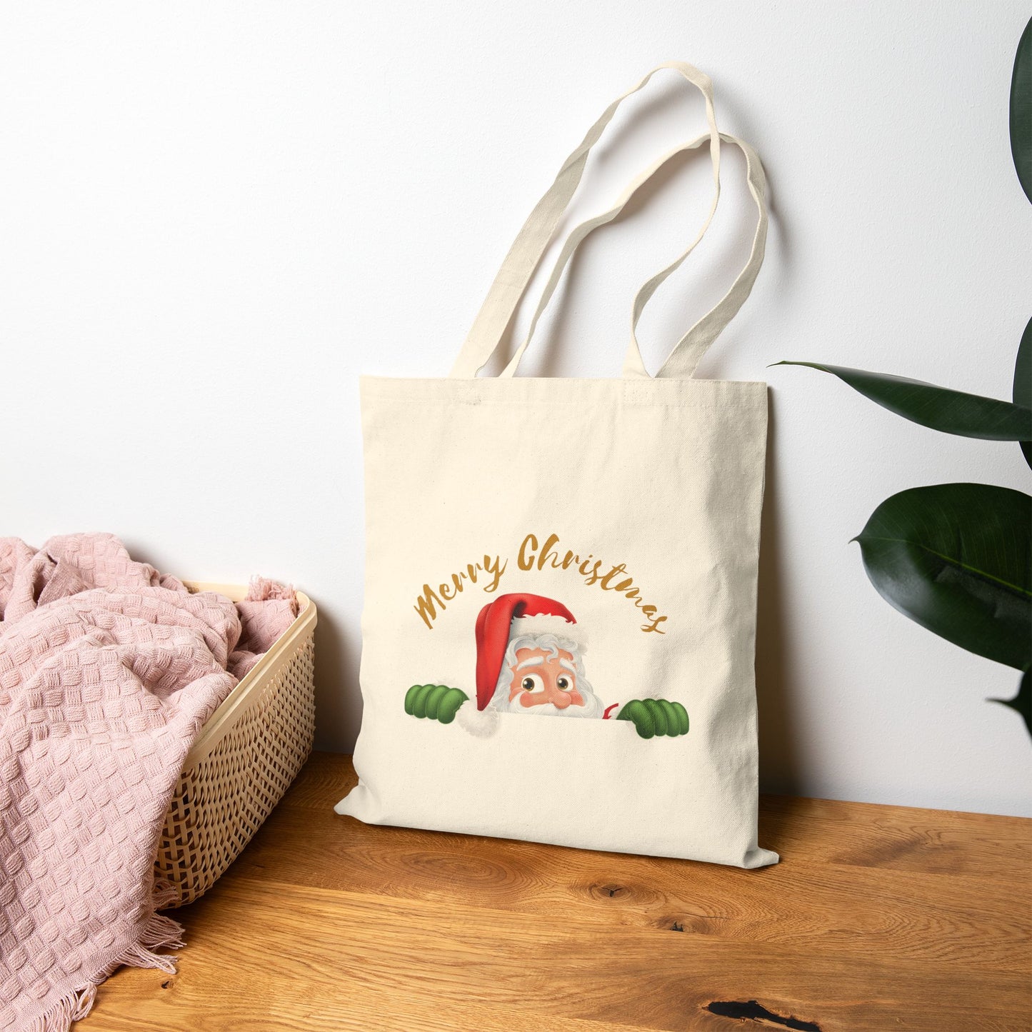 Tote bag with Santa Claus design and 'Merry Christmas' text on a Canvas Beige eco-friendly tote bag.