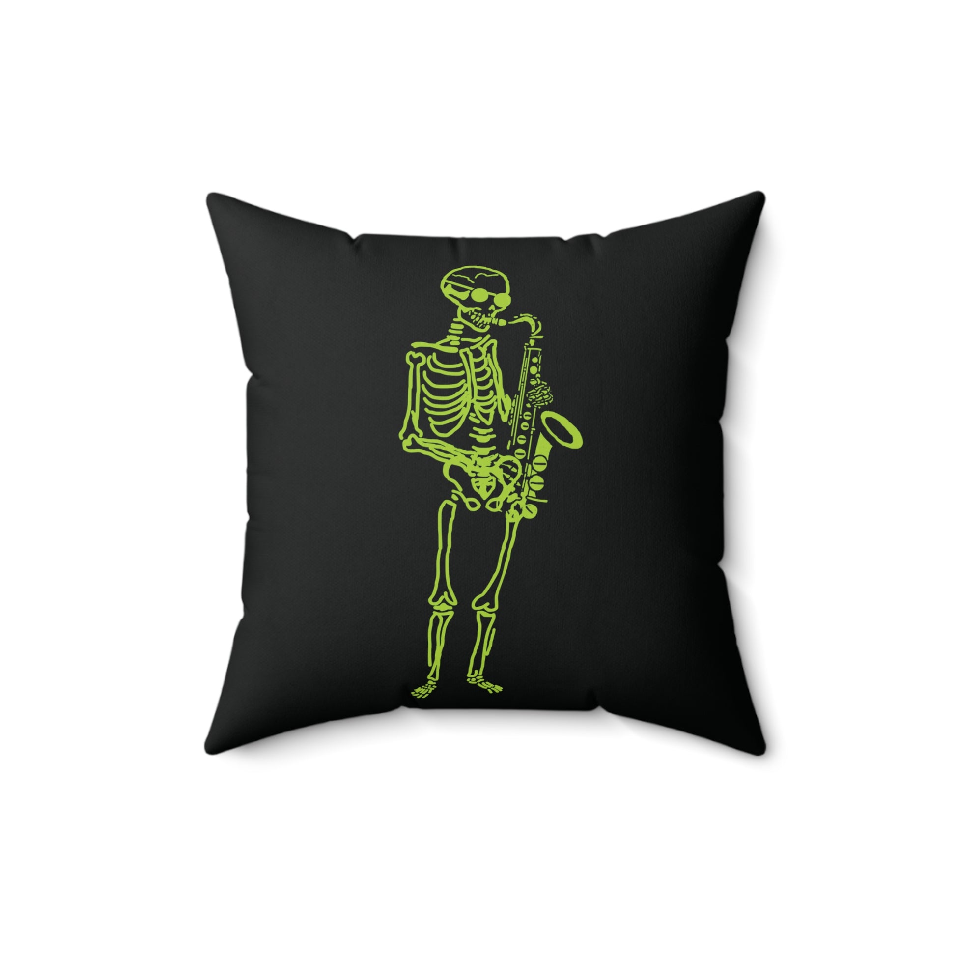Neon green skeleton playing the saxophone on a white square throw pillow.