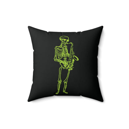 Neon green skeleton playing the saxophone on a white square throw pillow.