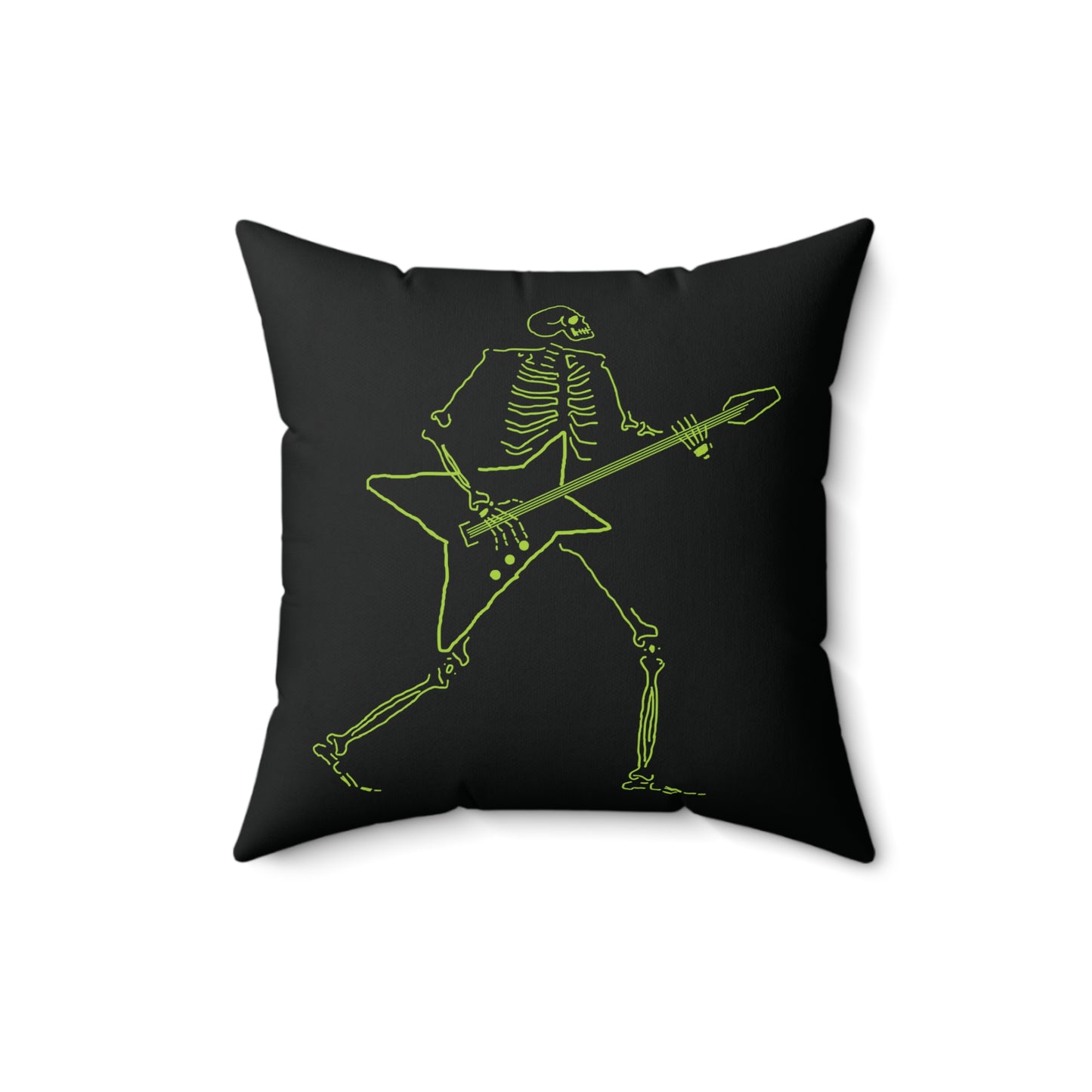 Neon green skeleton shredding on a star-shaped guitar on a white pillow.

