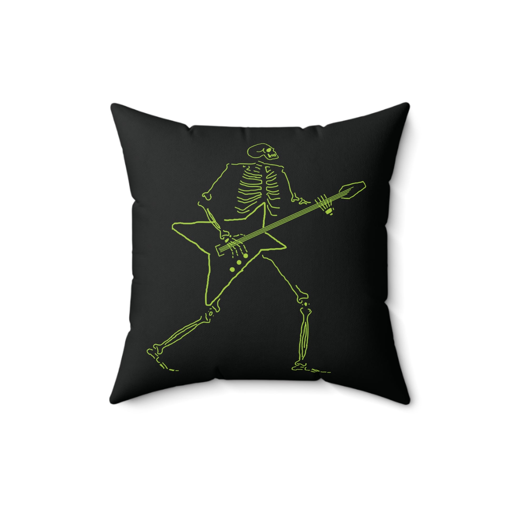 Neon green skeleton shredding on a star-shaped guitar on a white pillow.
