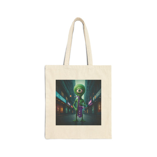 Alien playing sax in a empty city at Night. The alien Is featured on a Natural color Canvas tote bag.