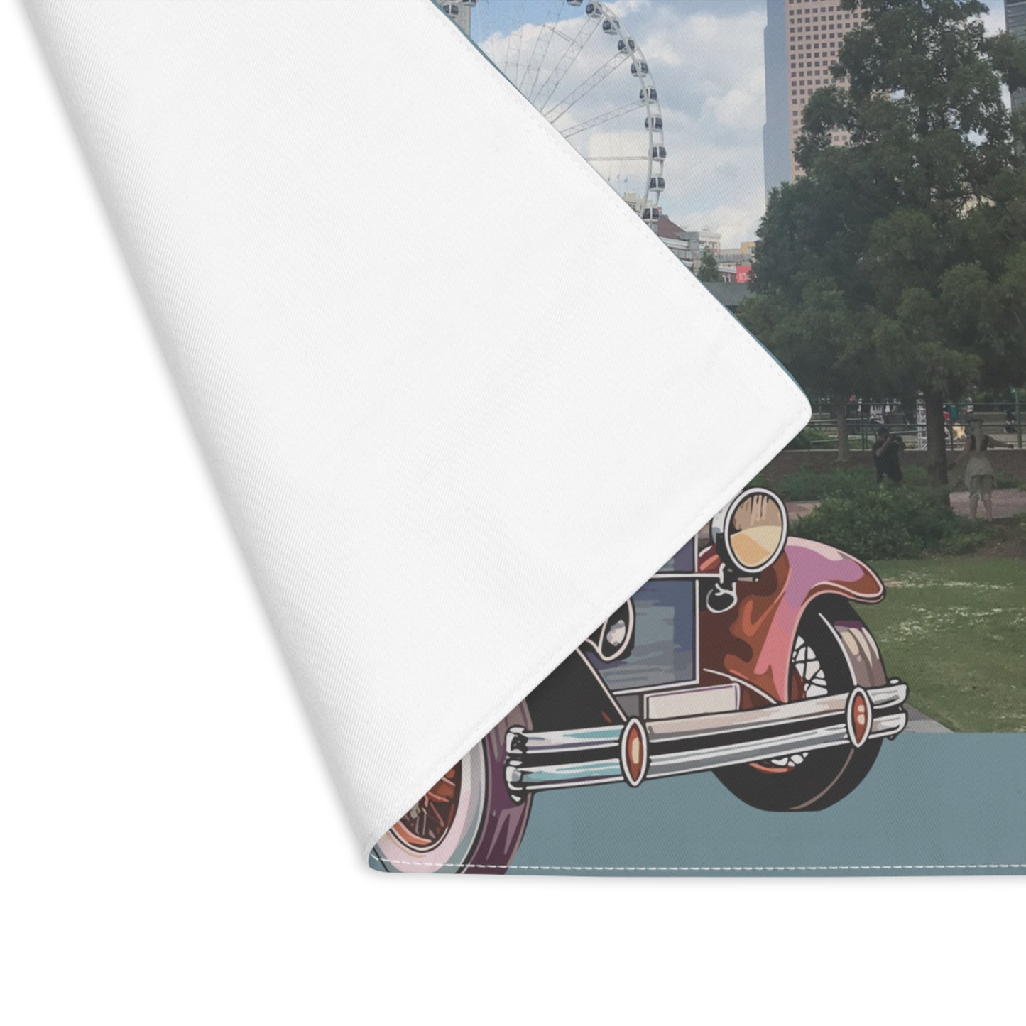 Roll of paper with a vintage car design on a white background