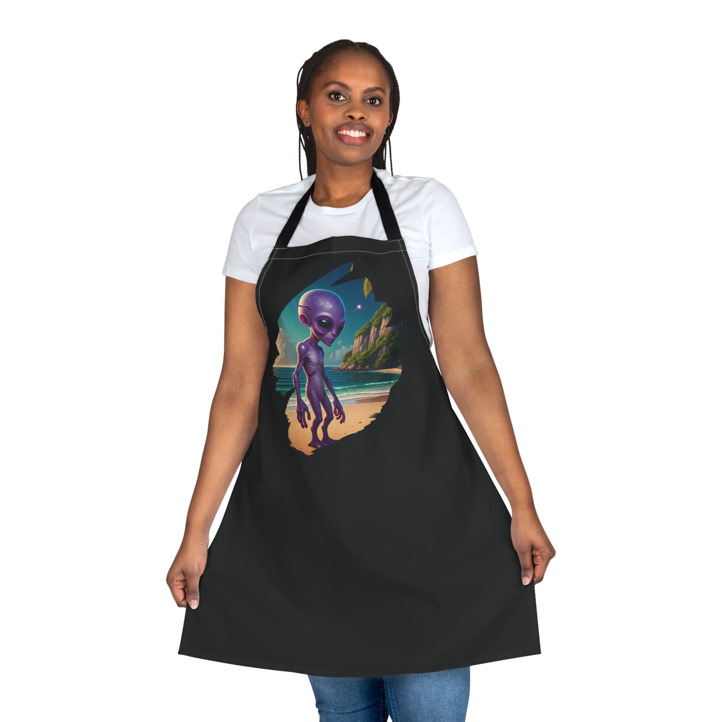 Person wearing a black unisex apron with an alien at beach original design
