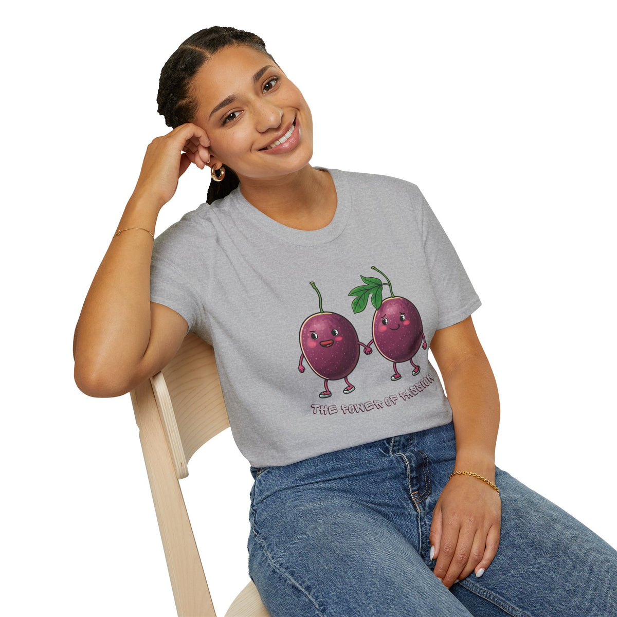 Woman sitting on a chair wearing a grey athletic fruits graphic t-shirt with a cute passion fruit design