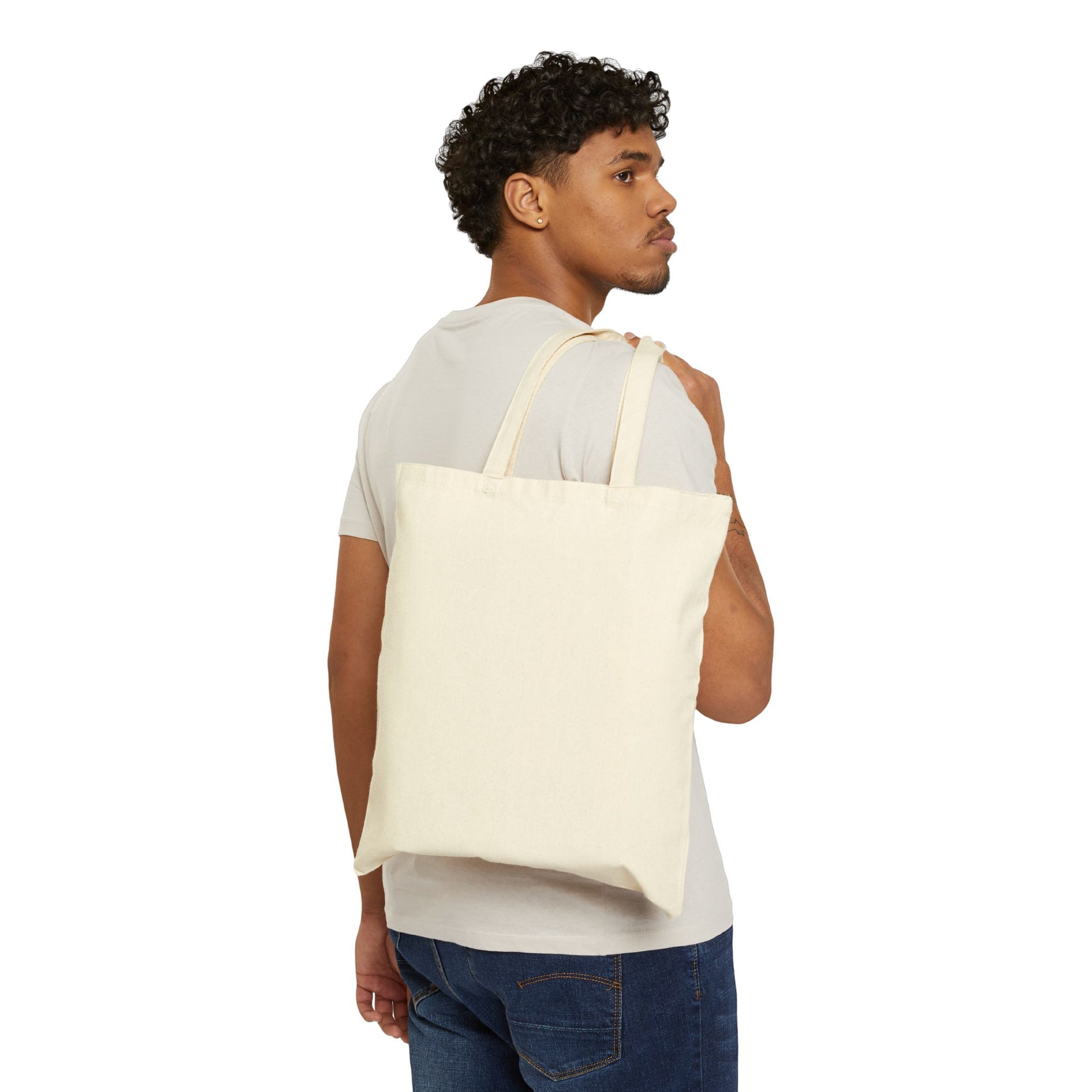 Alien at Beach natural color tote bag: a funny alien walking on a sandy beach. Backside man bag.