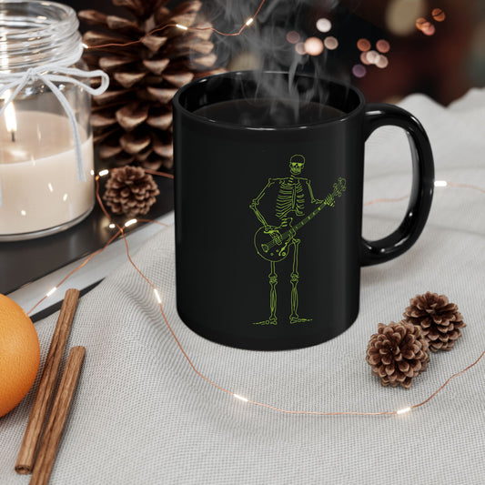 Black morphing mug with a skeleton playing bass guitar design