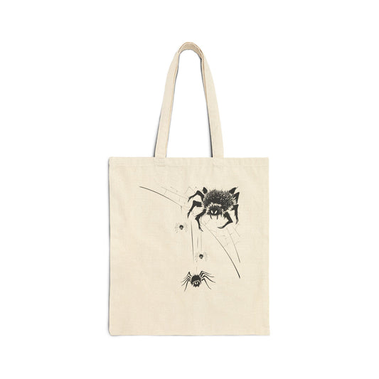 Beige tote bag with black spider design on a white background