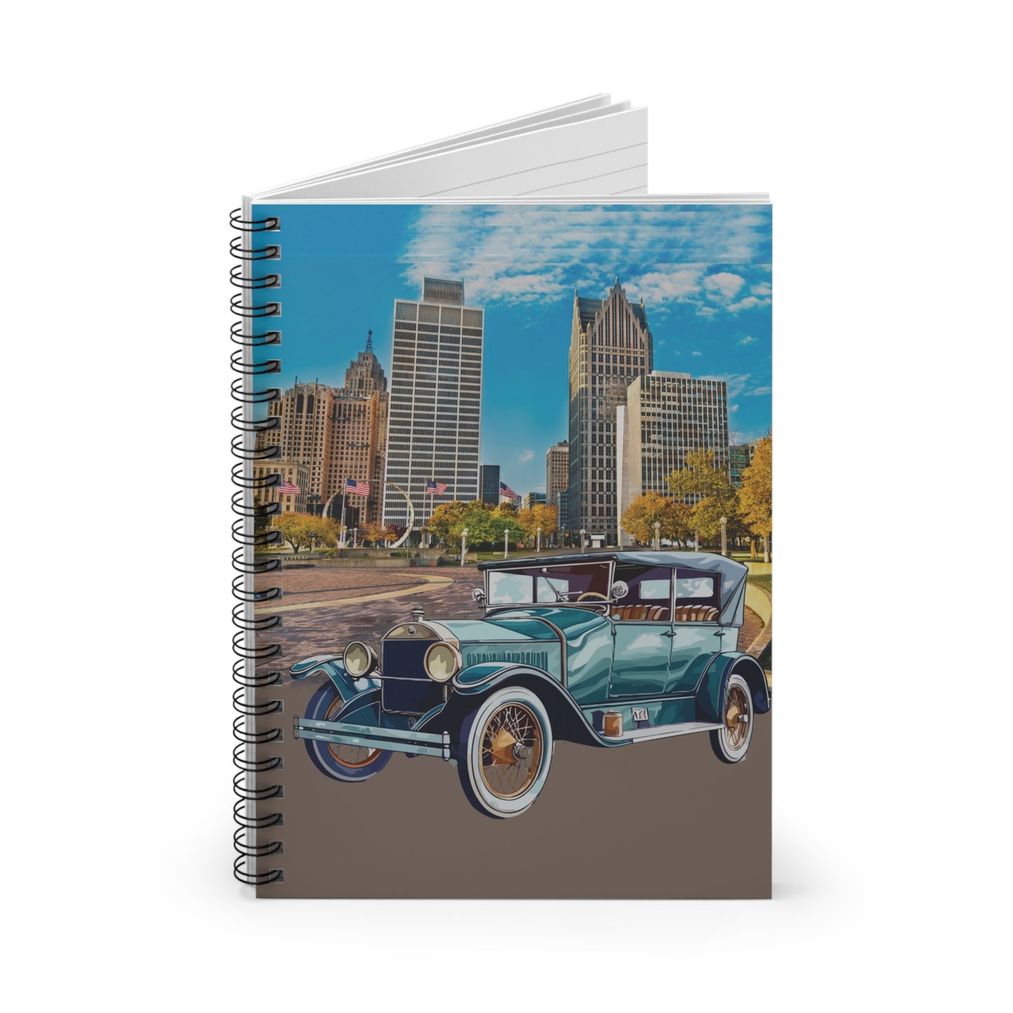 Notebook with a vintage Buick coupé car and cityscape design on the cover