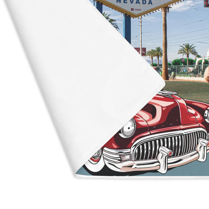 Red vintage car graphic on a placemat with a Las Vegas sign in the background