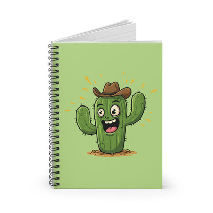 lose-up image of a spiral notebook with a funny cartoon cowboy cactus wearing a hat. Humorous Western stationery item for fans of the Wild West.