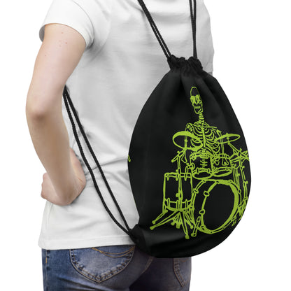Person wearing a black drawstring bag with green drum design