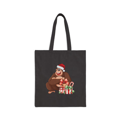 Close-up of Gorilla Christmas Canvas Tote Bag. Funny holiday gift for US stocking stuffer, showing full black canvas texture.