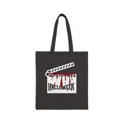 Black tote bag with Halloween-themed design featuring a clapboard and blood-like text on a white background