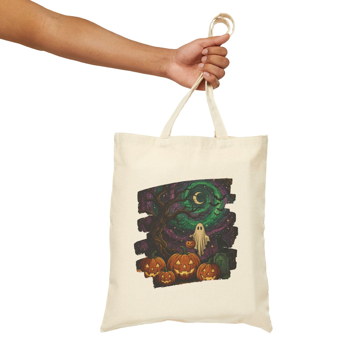 Man carrying a black spooky Halloween ghost and spiral moon graphic tote bag, ideal for alternative everyday style.