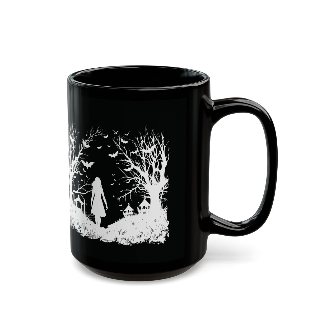 Isolated view of black ceramic Halloween coffee mug with spooky enchanted forest and moon design.