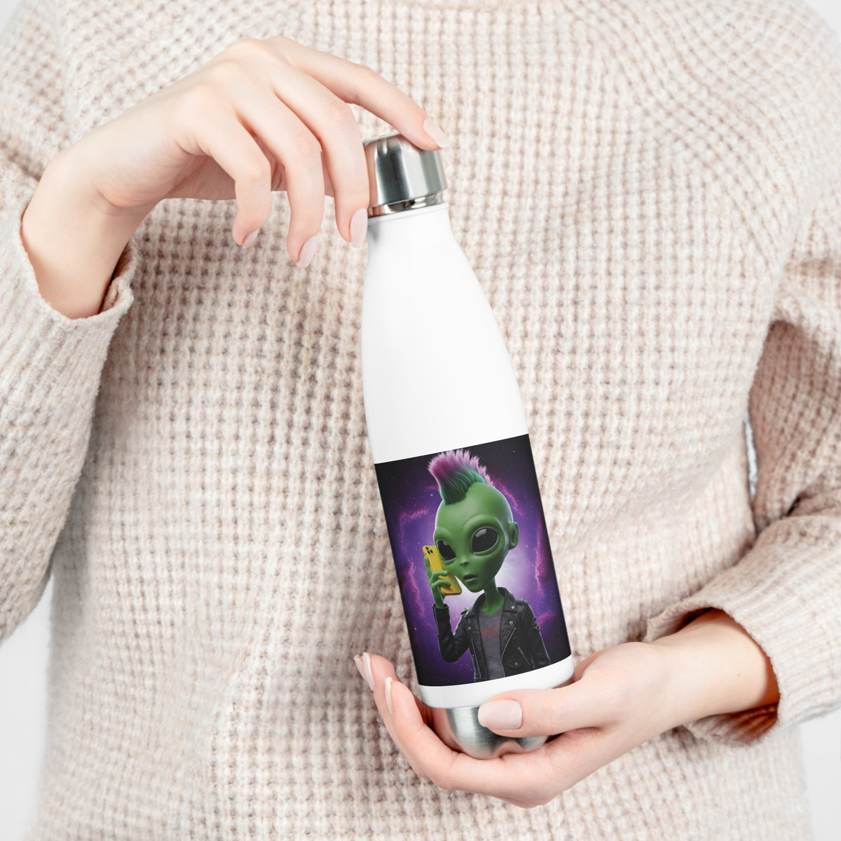 Close-up of hands opening the leak-proof screw cap of a white insulated travel water bottle with cyberpunk alien punk artwork.