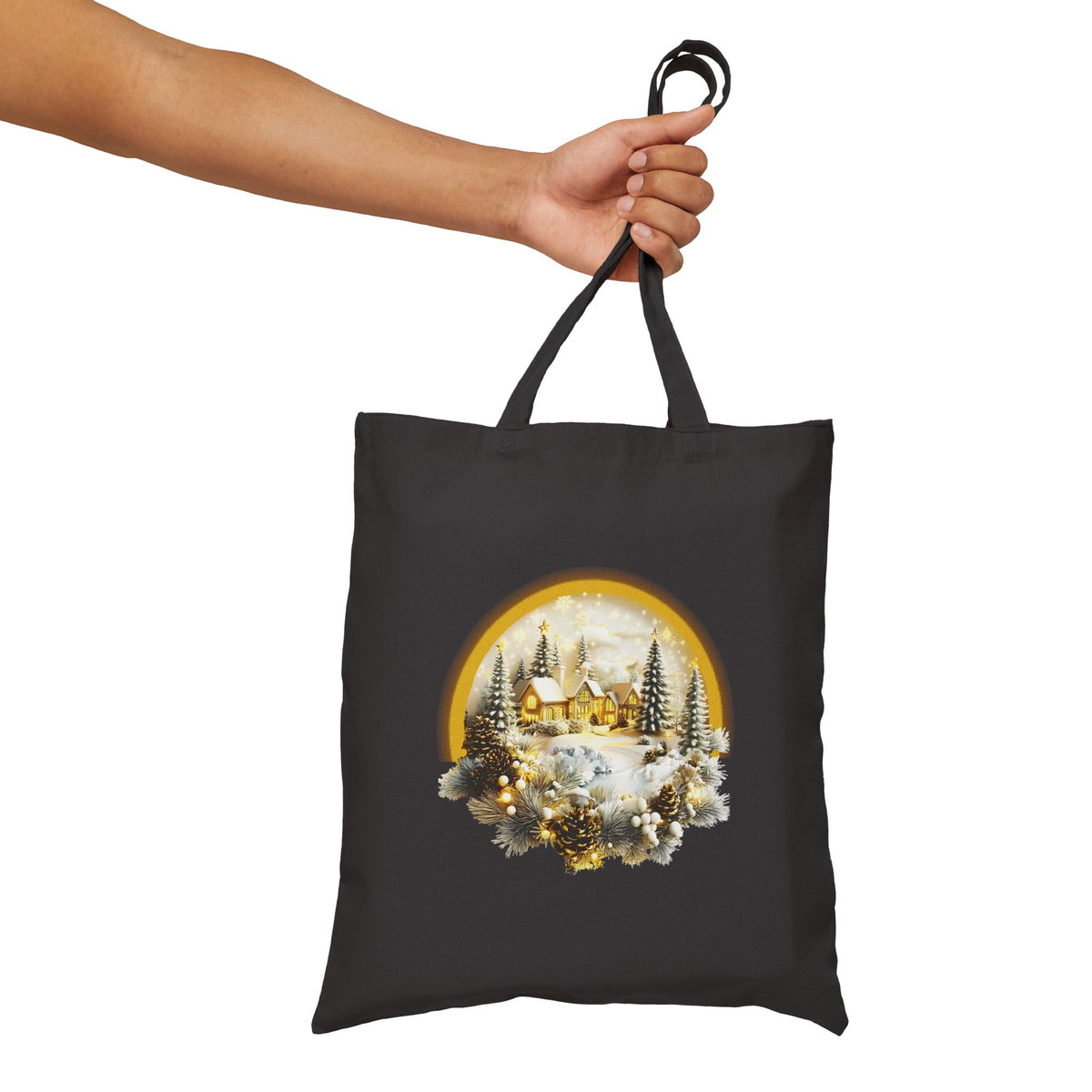 Black canvas tote bag featuring a magical glowing winter wonderland village illustration for festive holiday errands