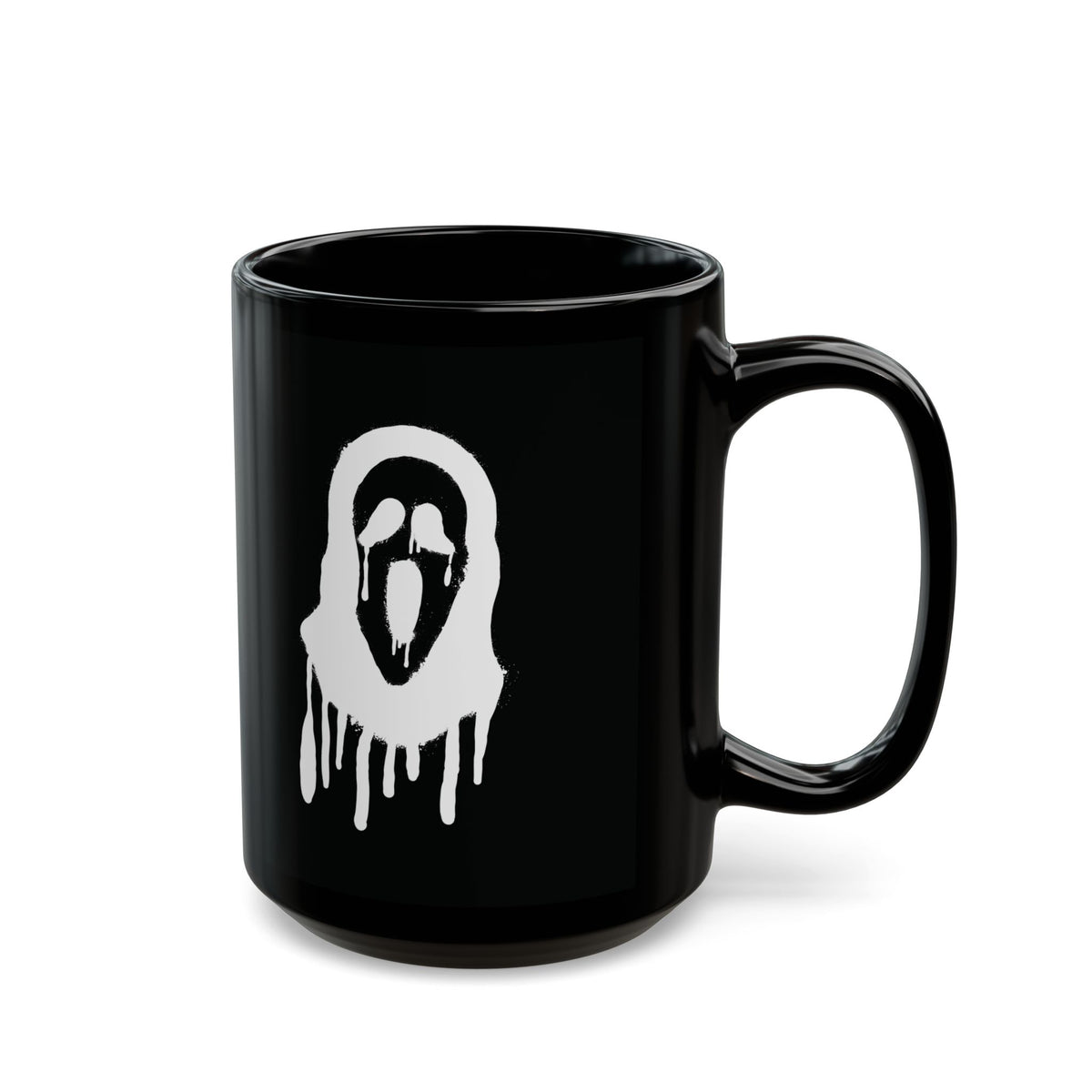 Isolated view of black ceramic Halloween coffee mug with spooky melting horror mask design.