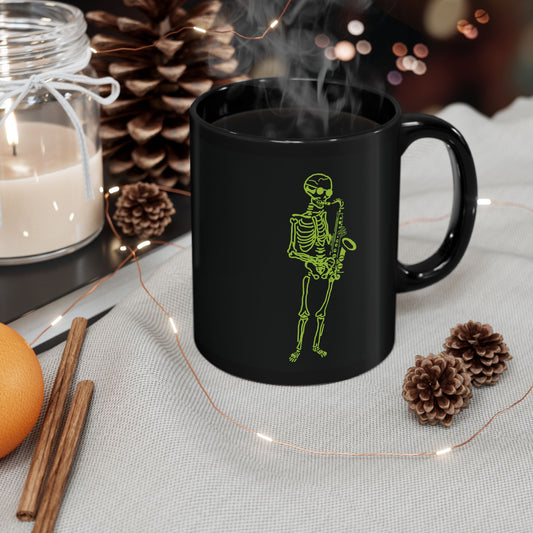 Black mug with a green metal skeleton fluo design 