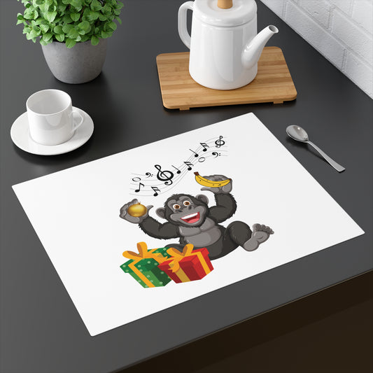 Cute Christmas placemat on a dining table featuring a happy gorilla holding a banana with musical notes and festive wrapped gifts for holiday table setting decor.