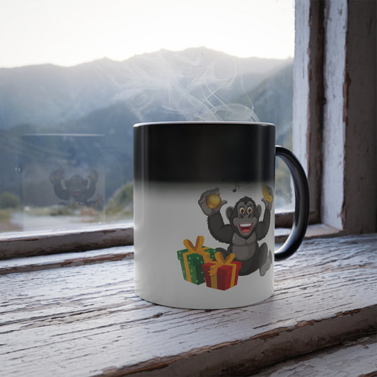 Heat sensitive color changing mug revealing a happy gorilla with musical notes, a banana, and Christmas gifts on a rustic wooden windowsill with a scenic mountain view.   