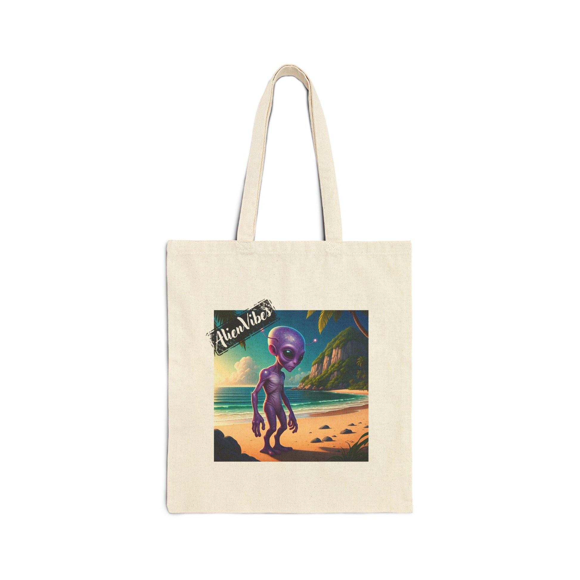 Alien at Beach natural color tote bag: a funny alien walking on a sandy beach.