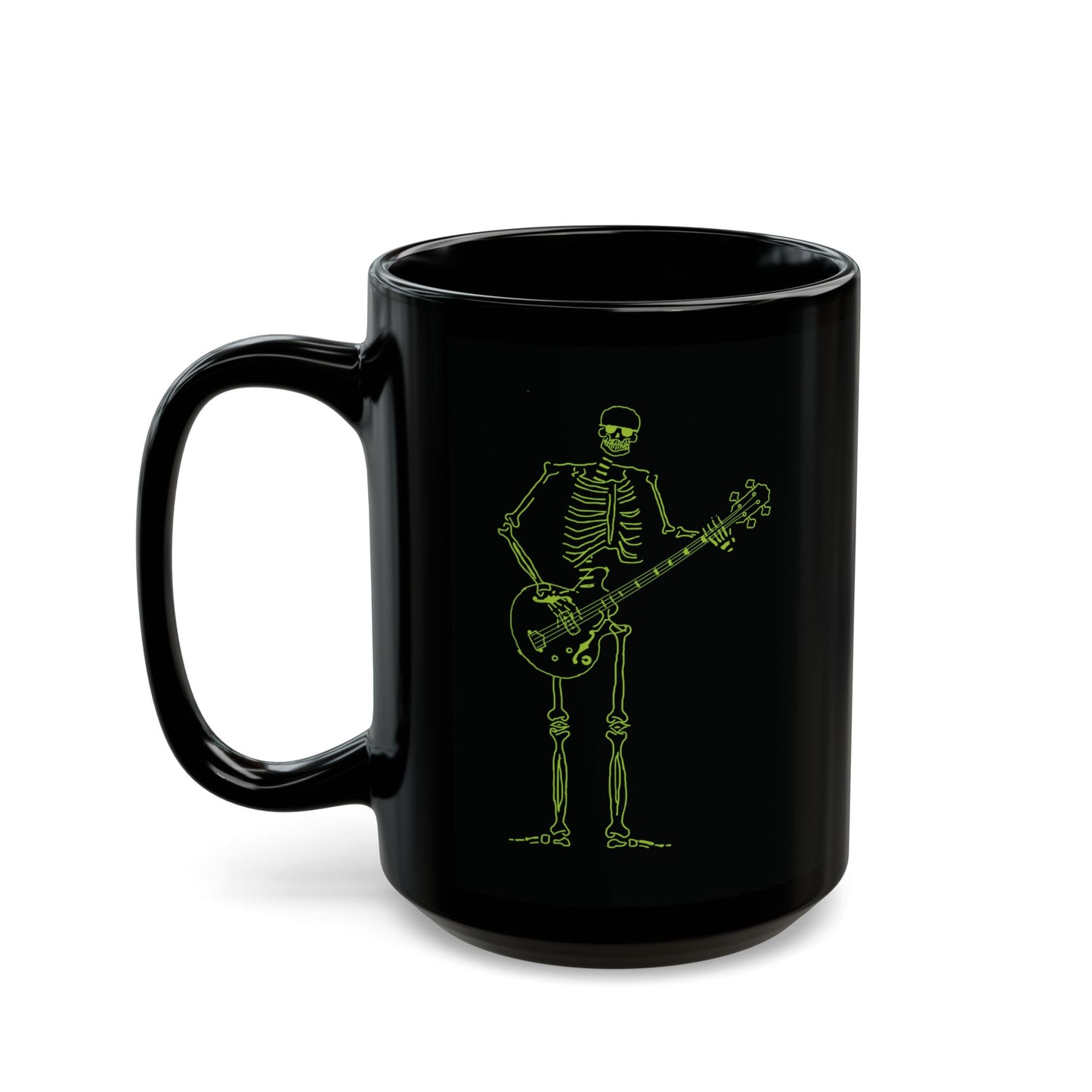 Photo of the black heat-sensitive cup showing the full revealed graphic of a skeleton playing a bass guitar.