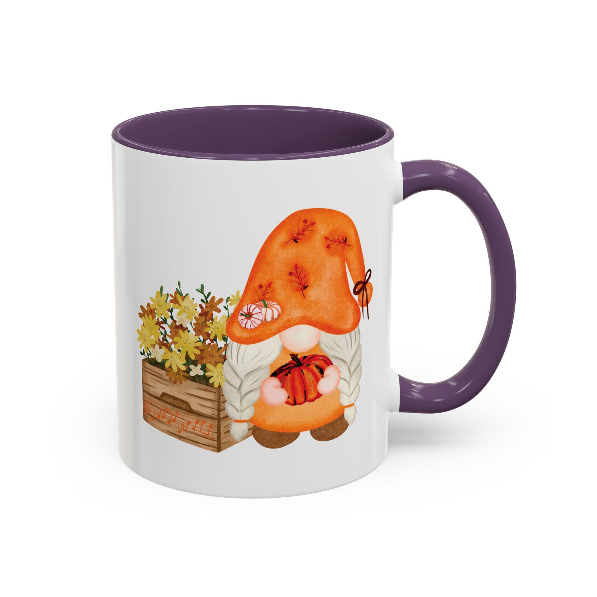 White and purple ceramic coffee mug with a colorful graphic of a mysterious gnome surrounded by autumn leaves and mushrooms.