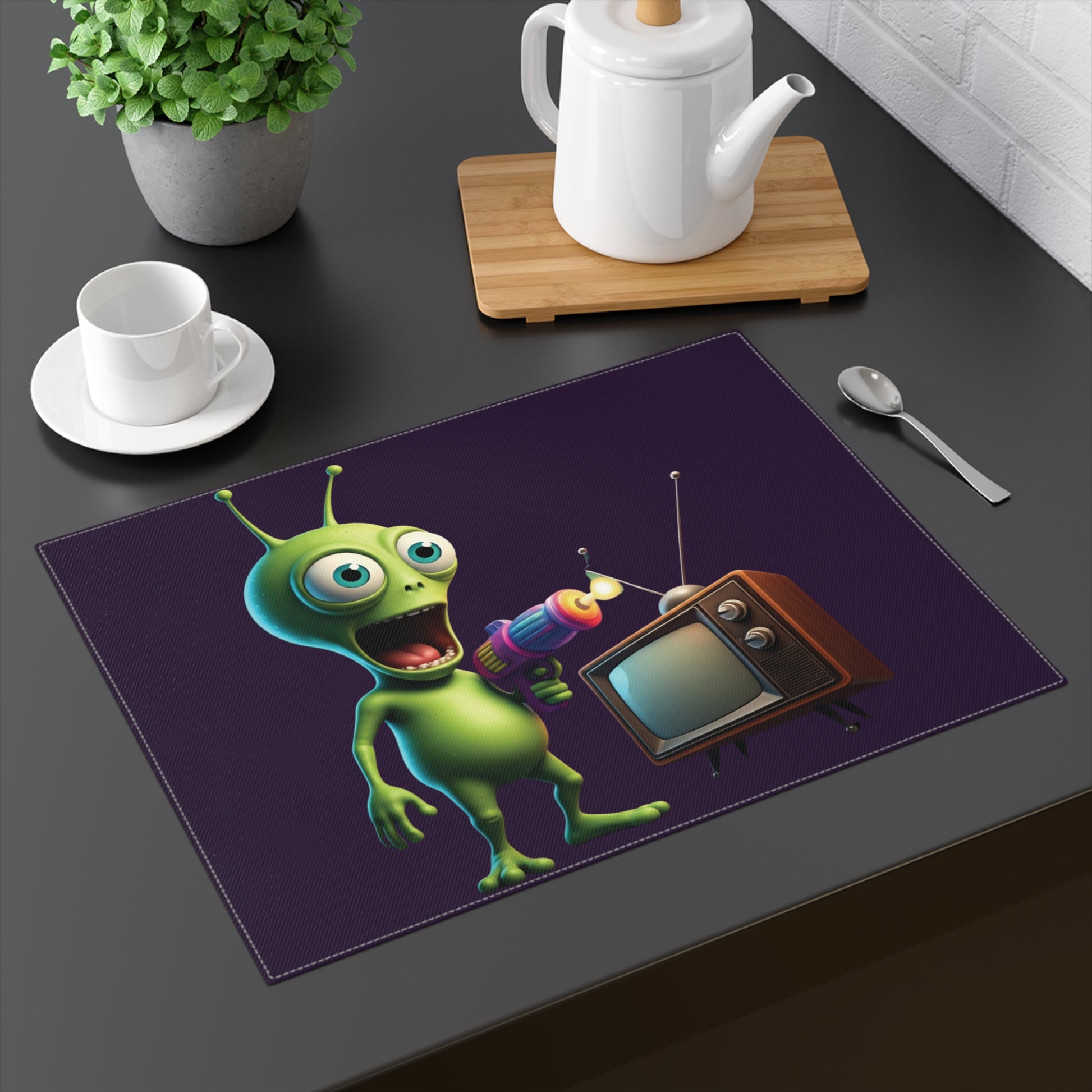 A funny green alien with a ray gun looking surprised at an old vintage television.