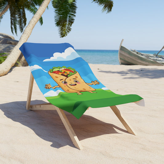 Beach towel with cartoon taco design on a beach chair, palm trees, and ocean in the background