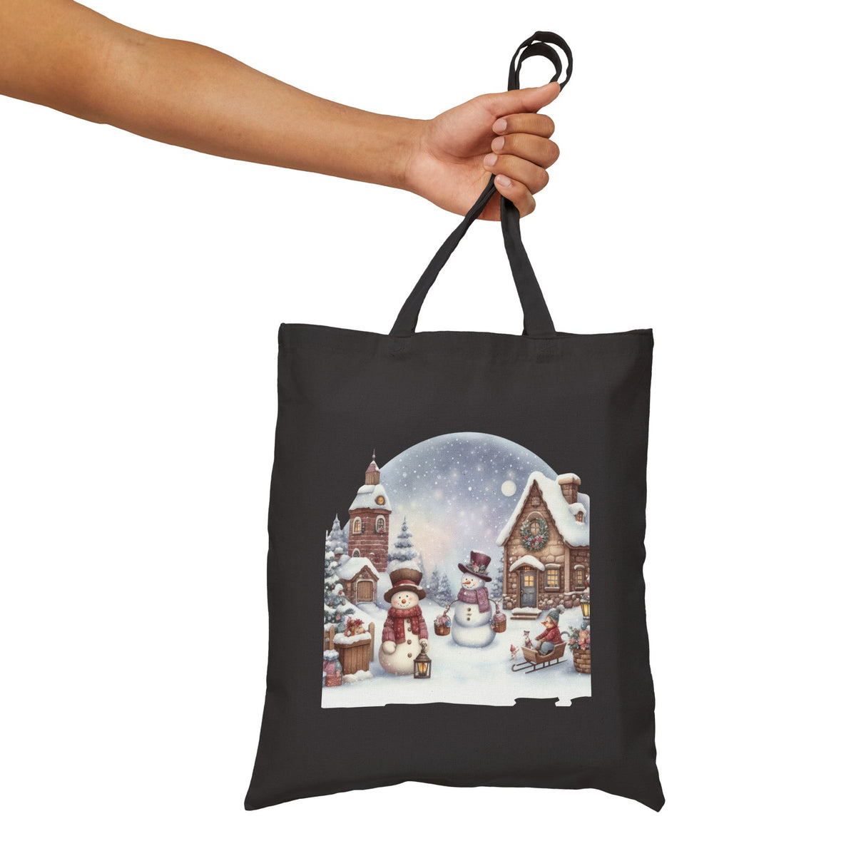 Black canvas tote bag featuring a vintage snowman winter town illustration for festive holiday grocery runs