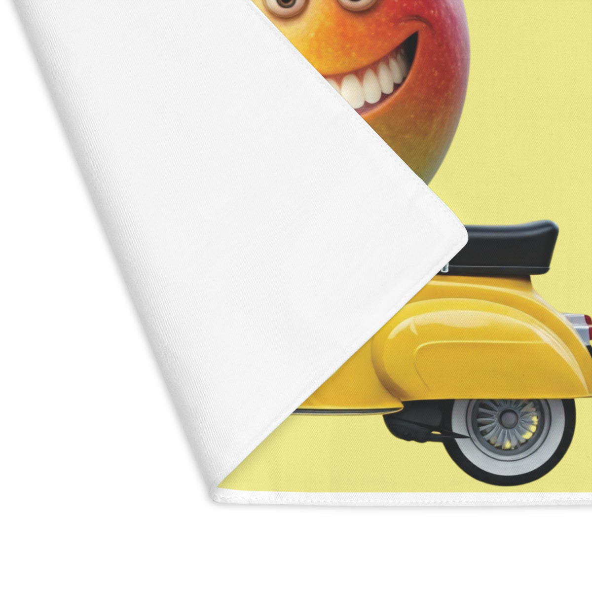 Close-up view of the folded corner showing the clean white backside and durable stitched edge of a washable dining table placemat.